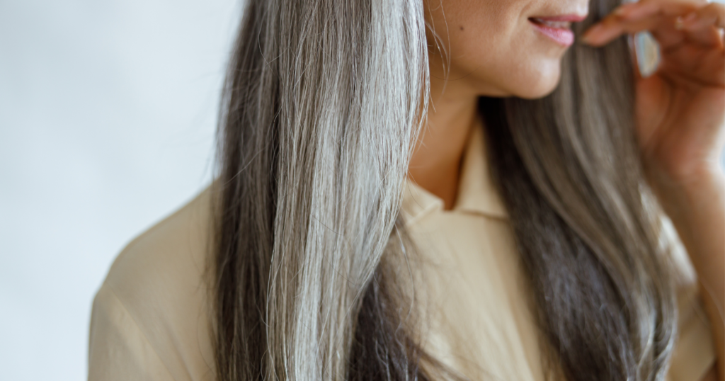 Beyond Solid Black: Modern Ways to Blend Gray Hair with Highlights and Balayage